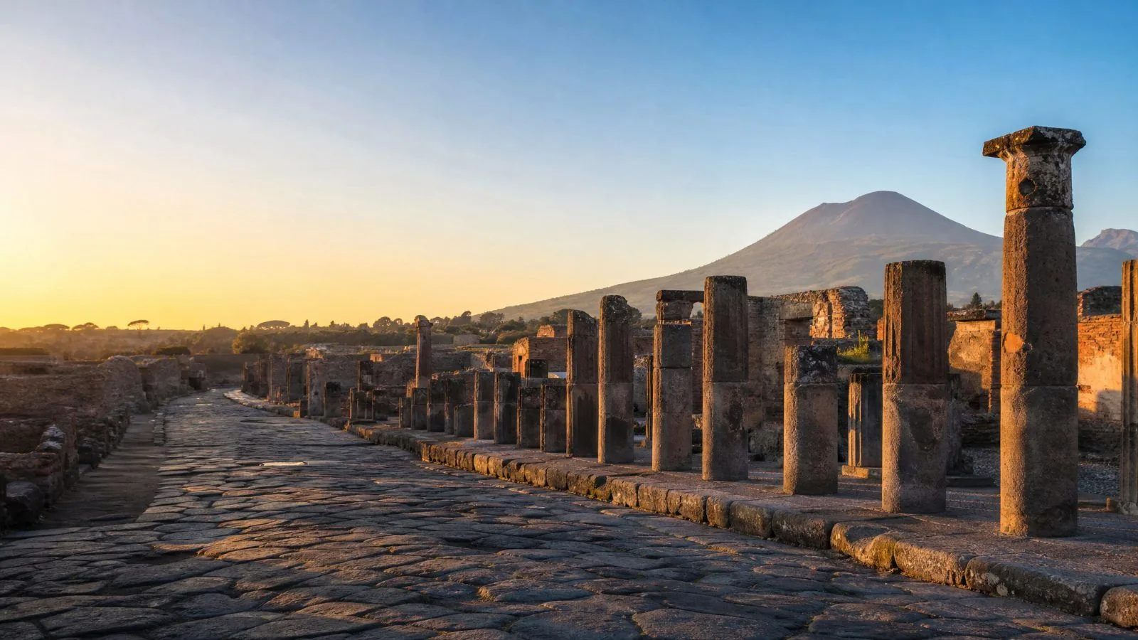 Pompeii’s Forum at dawn, with Mount Vesuvius in the background